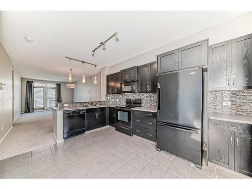 2316-125 Panatella Way Nw, Calgary, AB - Indoor Photo Showing Kitchen With Upgraded Kitchen