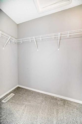 2316-125 Panatella Way Nw, Calgary, AB - Indoor With Storage