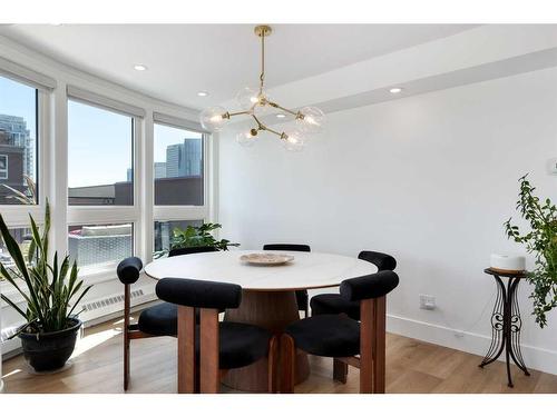 1704-400 Eau Claire Avenue Sw, Calgary, AB - Indoor Photo Showing Dining Room