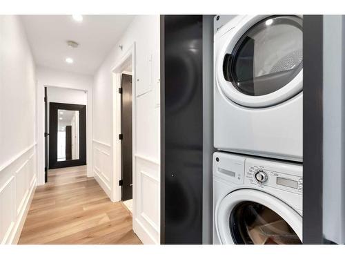 1704-400 Eau Claire Avenue Sw, Calgary, AB - Indoor Photo Showing Laundry Room