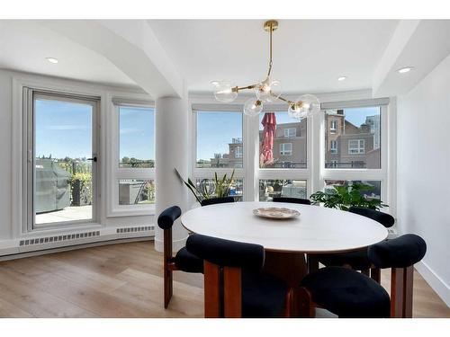 1704-400 Eau Claire Avenue Sw, Calgary, AB - Indoor Photo Showing Dining Room