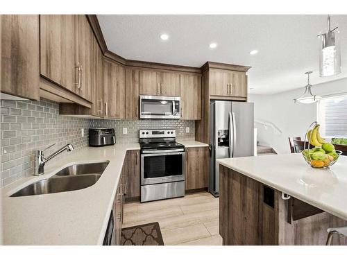 116 Yorkville Avenue Sw, Calgary, AB - Indoor Photo Showing Kitchen With Stainless Steel Kitchen With Double Sink With Upgraded Kitchen