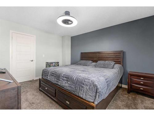 793 Luxstone Landing Sw, Airdrie, AB - Indoor Photo Showing Bedroom