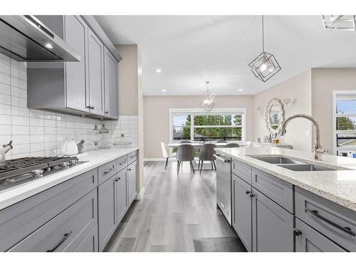 203 35A Street Sw, Calgary, AB - Indoor Photo Showing Kitchen With Double Sink With Upgraded Kitchen