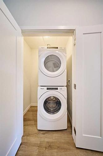 504-71 Shawnee Common Sw, Calgary, AB - Indoor Photo Showing Laundry Room