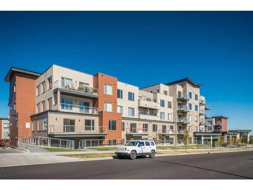 504-71 Shawnee Common Sw, Calgary, AB - Outdoor With Facade