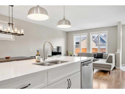 90 Seton Grove Se, Calgary, AB - Indoor Photo Showing Kitchen With Double Sink With Upgraded Kitchen