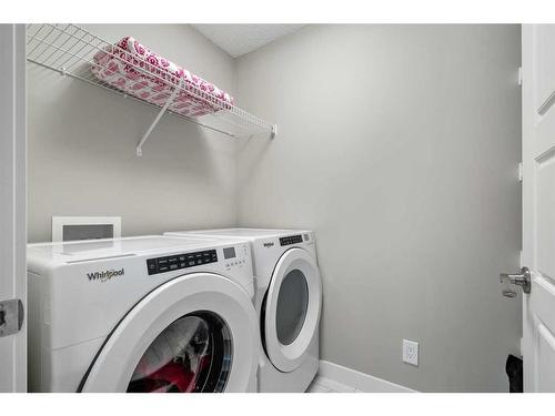 90 Seton Grove Se, Calgary, AB - Indoor Photo Showing Laundry Room