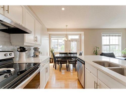 193 Rockyspring Grove Nw, Calgary, AB - Indoor Photo Showing Kitchen With Stainless Steel Kitchen With Double Sink