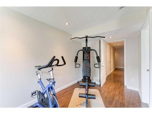 193 Rockyspring Grove Nw, Calgary, AB - Indoor Photo Showing Gym Room