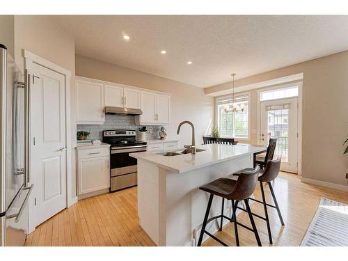 193 Rockyspring Grove Nw, Calgary, AB - Indoor Photo Showing Kitchen With Upgraded Kitchen