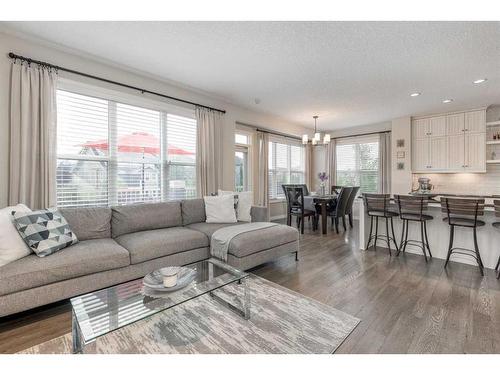 83 Sundown Way, Cochrane, AB - Indoor Photo Showing Living Room