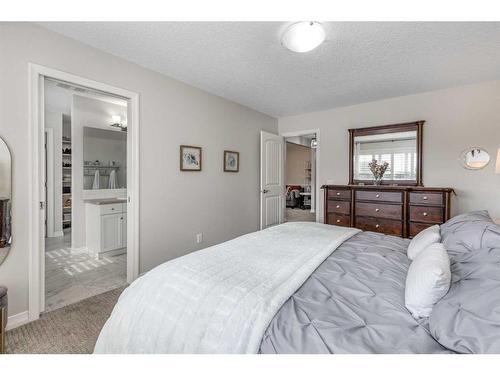 83 Sundown Way, Cochrane, AB - Indoor Photo Showing Bedroom