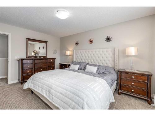 83 Sundown Way, Cochrane, AB - Indoor Photo Showing Bedroom