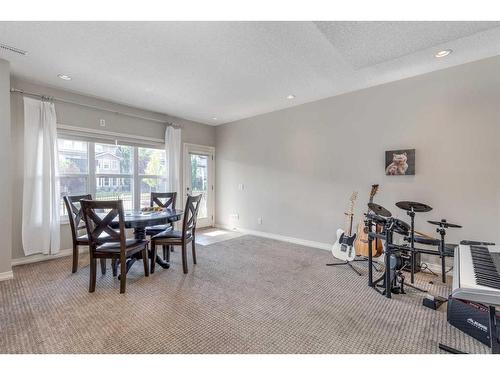 83 Sundown Way, Cochrane, AB - Indoor Photo Showing Dining Room