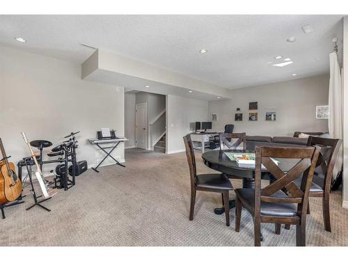 83 Sundown Way, Cochrane, AB - Indoor Photo Showing Dining Room