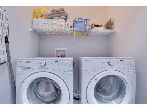 64 Evansglen Close Nw, Calgary, AB - Indoor Photo Showing Laundry Room