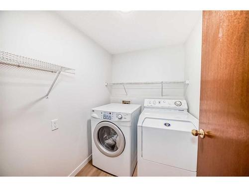 19 Macewan Ridge Close Nw, Calgary, AB - Indoor Photo Showing Laundry Room