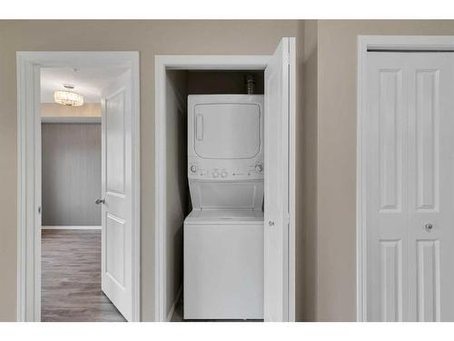 217-195 Kincora Glen Road Nw, Calgary, AB - Indoor Photo Showing Laundry Room