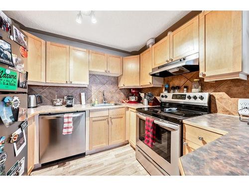 4-310 22 Avenue Sw, Calgary, AB - Indoor Photo Showing Kitchen With Stainless Steel Kitchen