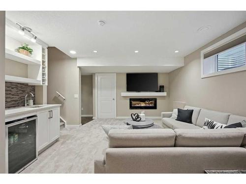 321 Marquis Heights Se, Calgary, AB - Indoor With Fireplace