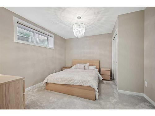 321 Marquis Heights Se, Calgary, AB - Indoor Photo Showing Bedroom