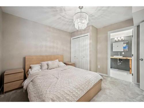 321 Marquis Heights Se, Calgary, AB - Indoor Photo Showing Bedroom