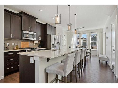 321 Marquis Heights Se, Calgary, AB - Indoor Photo Showing Kitchen With Upgraded Kitchen