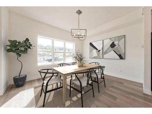 905-525 River Heights Drive, Cochrane, AB - Indoor Photo Showing Dining Room