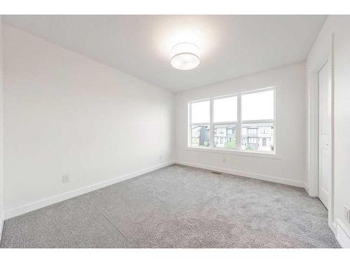 905-525 River Heights Drive, Cochrane, AB - Indoor Photo Showing Other Room