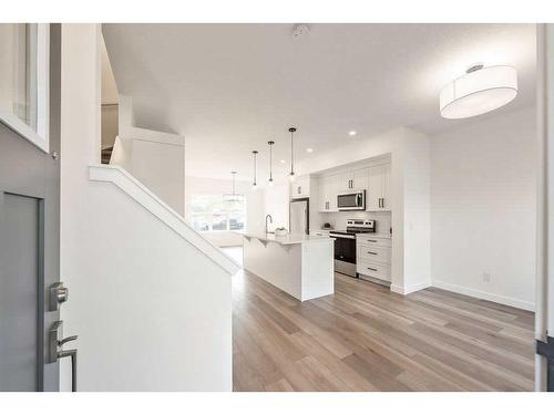 905-525 River Heights Drive, Cochrane, AB - Indoor Photo Showing Kitchen