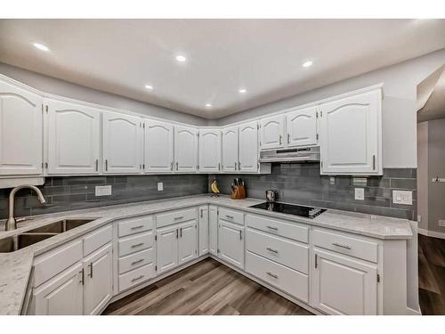 122 Evergreen Terrace Sw, Calgary, AB - Indoor Photo Showing Kitchen With Double Sink