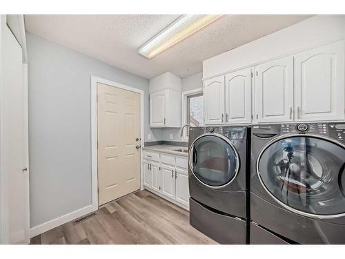 122 Evergreen Terrace Sw, Calgary, AB - Indoor Photo Showing Laundry Room