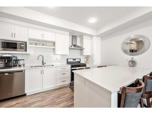 1210-100 Walgrove Court Se, Calgary, AB - Indoor Photo Showing Kitchen With Stainless Steel Kitchen With Upgraded Kitchen