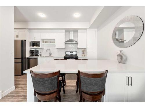 1210-100 Walgrove Court Se, Calgary, AB - Indoor Photo Showing Kitchen With Stainless Steel Kitchen With Upgraded Kitchen