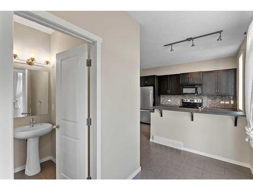 2302-125 Panatella Way Nw, Calgary, AB - Indoor Photo Showing Kitchen