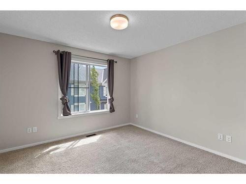 2302-125 Panatella Way Nw, Calgary, AB - Indoor Photo Showing Other Room