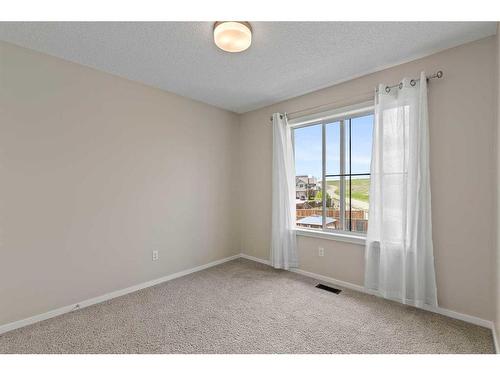 2302-125 Panatella Way Nw, Calgary, AB - Indoor Photo Showing Other Room