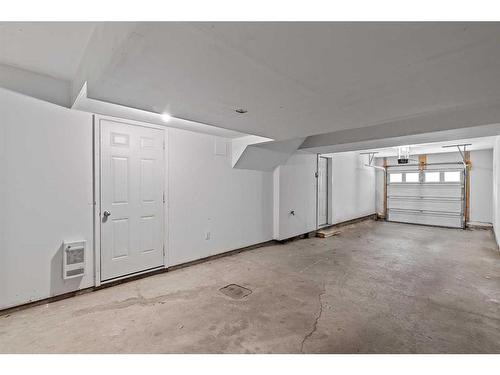 2302-125 Panatella Way Nw, Calgary, AB - Indoor Photo Showing Garage