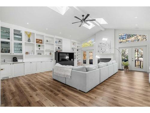 1102 Levis Avenue Sw, Calgary, AB - Indoor Photo Showing Living Room With Fireplace