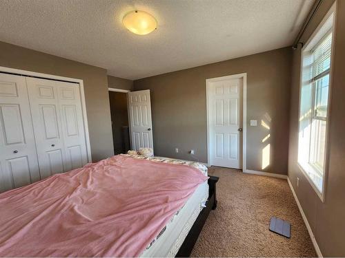 1061 Panatella Boulevard Nw, Calgary, AB - Indoor Photo Showing Bedroom