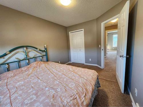 1061 Panatella Boulevard Nw, Calgary, AB - Indoor Photo Showing Bedroom