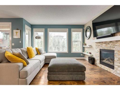 9 Nolanfield Point Nw, Calgary, AB - Indoor Photo Showing Living Room With Fireplace