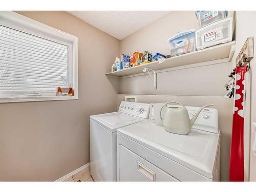 169 Rockbluff Close Nw, Calgary, AB - Indoor Photo Showing Laundry Room