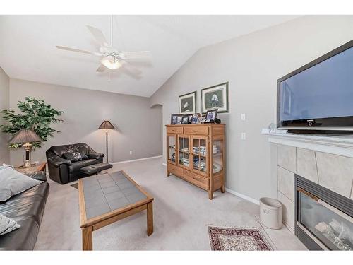 169 Rockbluff Close Nw, Calgary, AB - Indoor Photo Showing Other Room With Fireplace