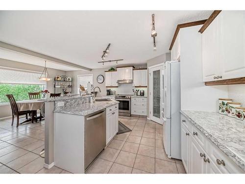 169 Rockbluff Close Nw, Calgary, AB - Indoor Photo Showing Kitchen With Upgraded Kitchen