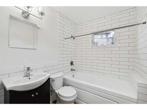 1 Meadowview Road Sw, Calgary, AB - Indoor Photo Showing Bathroom