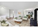 1 Meadowview Road Sw, Calgary, AB  - Indoor Photo Showing Living Room 