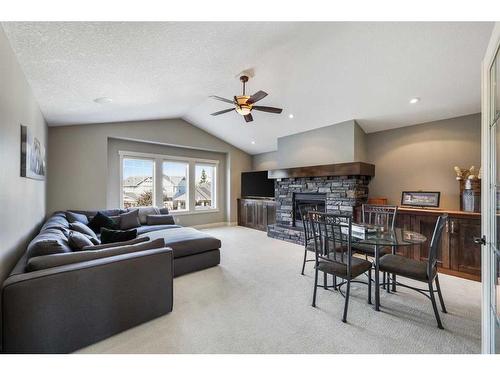 371 Chapala Point Se, Calgary, AB - Indoor Photo Showing Living Room With Fireplace