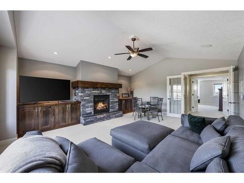 371 Chapala Point Se, Calgary, AB - Indoor Photo Showing Living Room With Fireplace